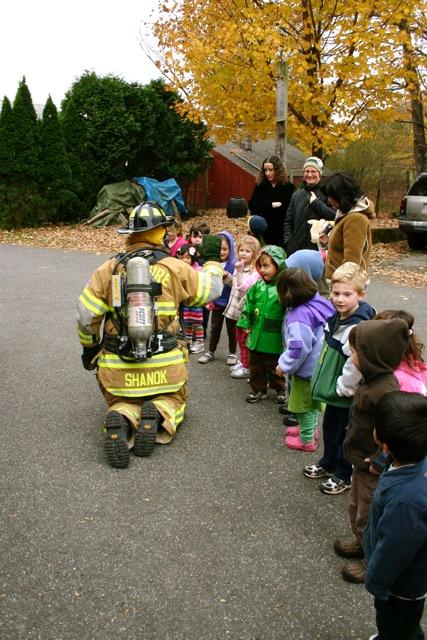 Firefighters teach fire safety to children at the Boulder Knoll Montessori School (October 2009).